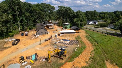difference of subdivision and village|An EcoVillage, a new commons and more in the works this .